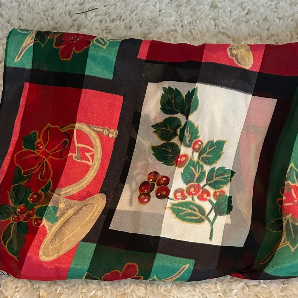 Holiday Scarf with Holly Design 58 inches long and 13 inches wide . There were.